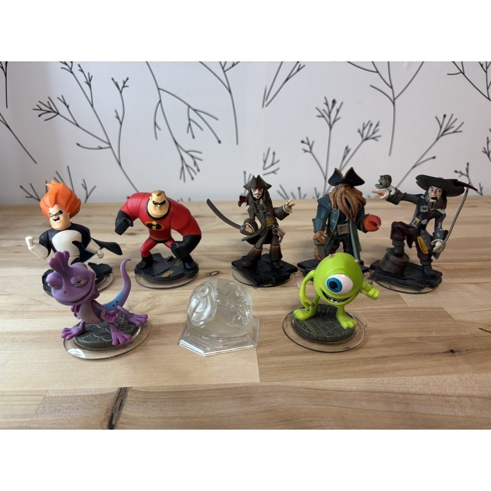 Disney Infinity Incredibles, Pirates of the Caribbean, Monsters Inc Lot